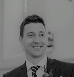 A picture of a man with short hair.