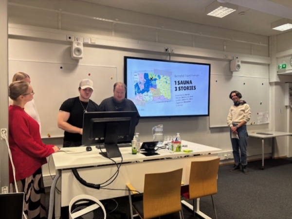 A group of people presenting.