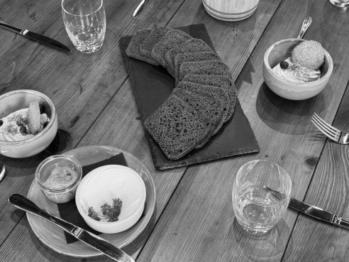 Bread and condiments on a table
