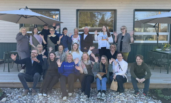 A group picture taken outside.